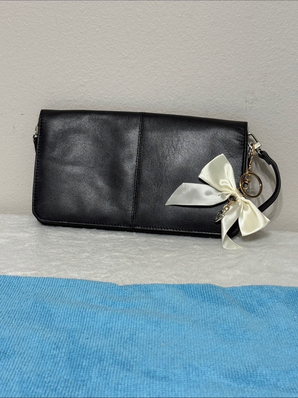 Pelle Studio Classic Black Leather Wristlet Clutch with Ivory Bow Accent